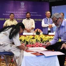 The Union Minister for Minority Affairs, Shri Mukhtar Abbas Naqvi witnessing the signing of MoUs, at the National Conference of Principal Secretaries-Secretaries in-charge of States - UTs dealing with Minority Affairs, in New Delhi on July 16, 2018.